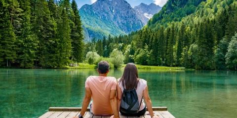 Couple looking out at a lake